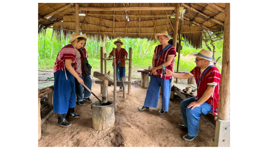 Guests making herbal supplements for the elephants at the camp