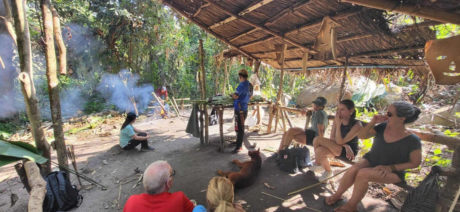 Our guide cooking over an open fire at the jungle camp